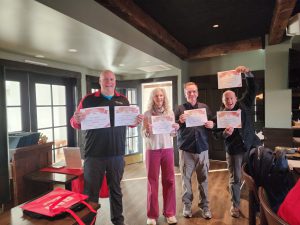 November 2025: Ben Cameron, Lindy Ost, Todd Langhill, and Kyle Stoddard (Not Pictured)