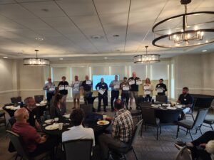 April 2026: Peter Morgan, Todd Langhill, Bob Warren, Scott Goodwin, Calvin Hunter, Frank Smith, Kyle Stoddard. Ben Cameron, Tami Goodrich, Val Parziale